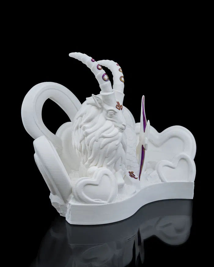 White ceramic sculpture of a mythical Capricorn with intricate details on a black background